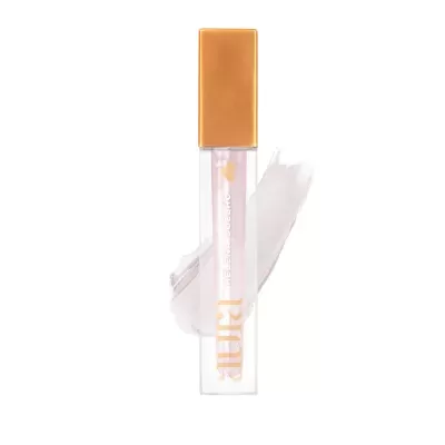 Produto cosmético em embalagem transparente com tampa dourada e texto em dourado.