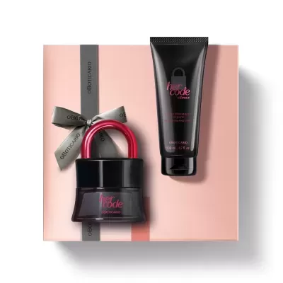 Conjunto Her Code O Boticário com perfume e loção hidratante sobre caixa rosa