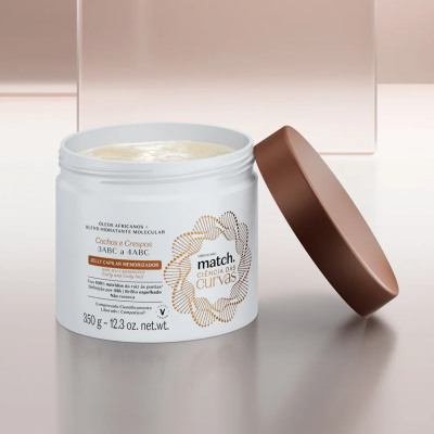 Frasco branco aberto com gel capilar e tampa castanha ao lado