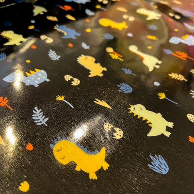 Tecido Plastificado | Dinossauros Coloridos