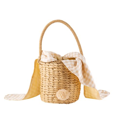 Cesto de mão em fibra natural com alça e laço às riscas amarelo e branco