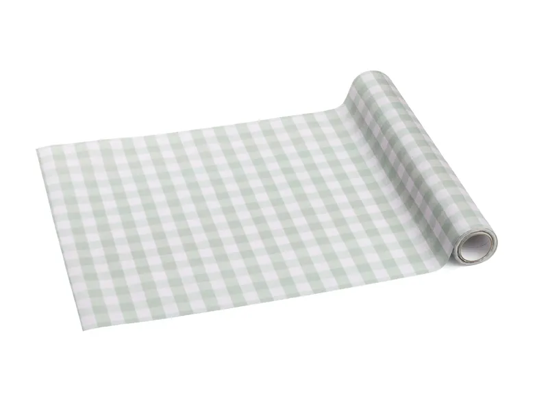 Rolo de papel ou plástico xadrez verde e branco desenrolado