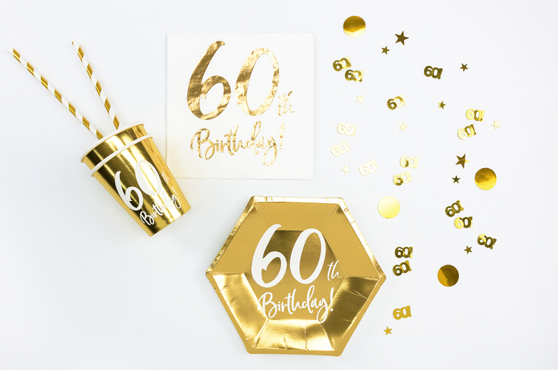 Artigos de festa dourados com texto '60 Birthday' em fundo branco.