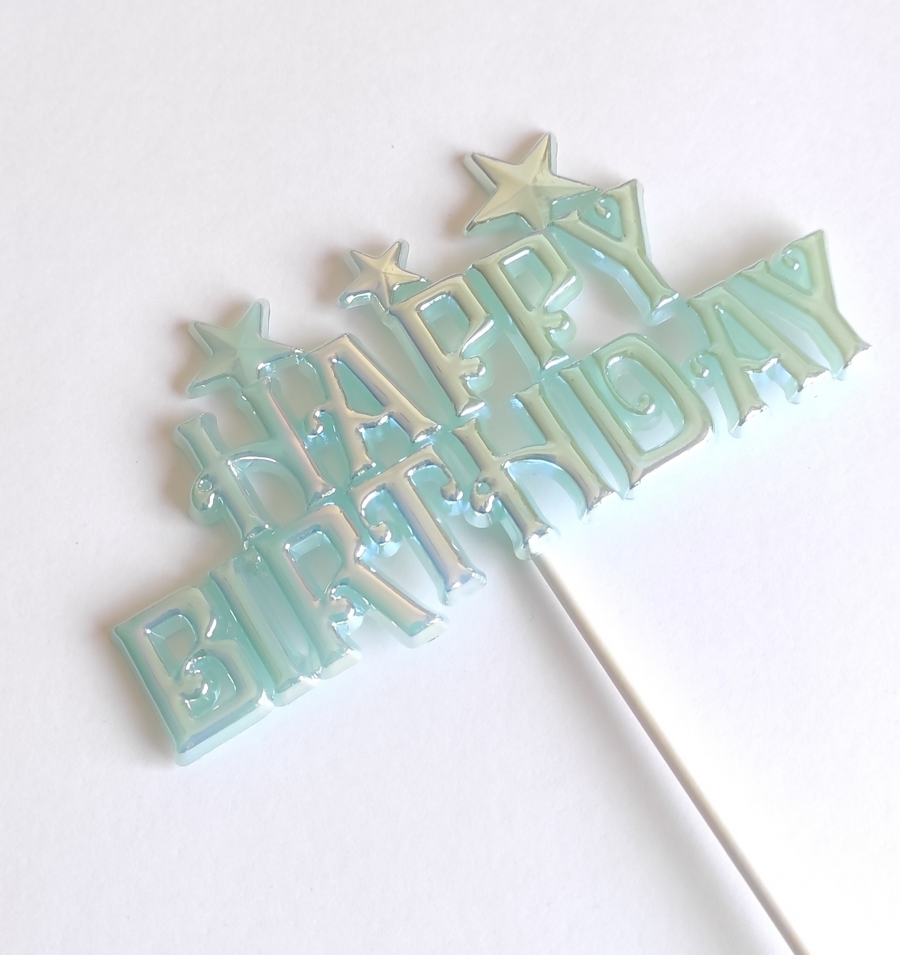 Topo de bolo feliz aniversário azul claro com estrelas