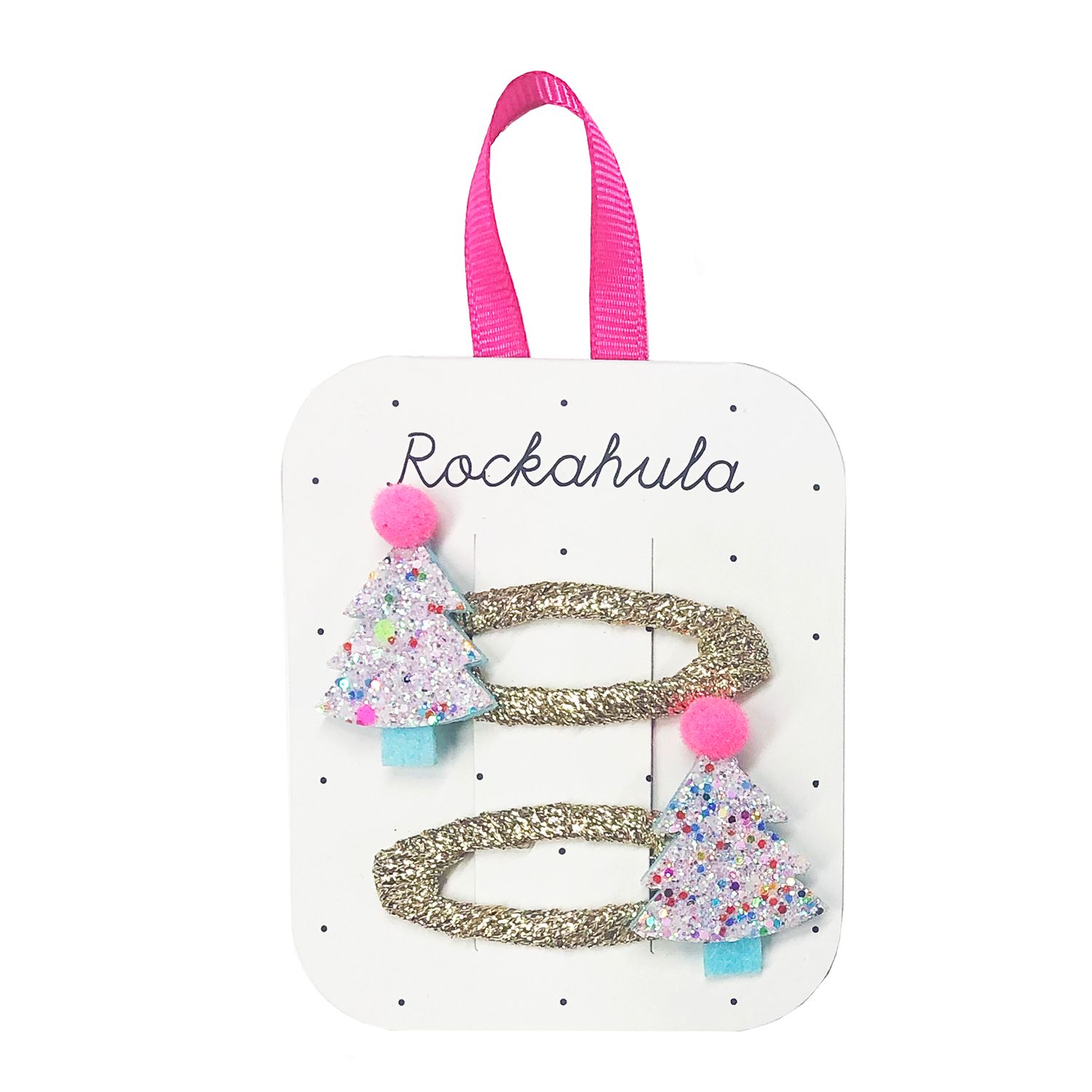 Dois ganchos para cabelo dourados com árvores de Natal decorativas e pompons rosa, em cartão branco com texto e fita rosa.