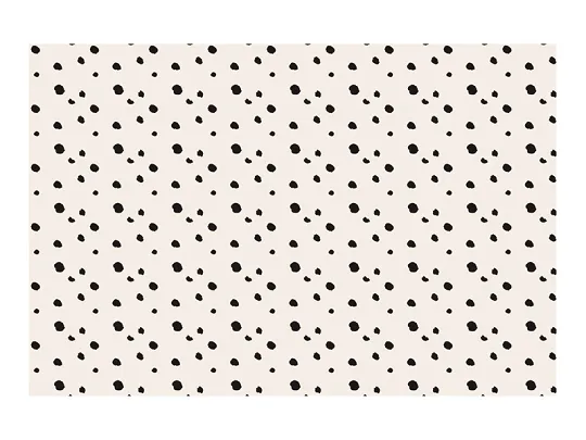 Tapete branco com manchas pretas irregulares