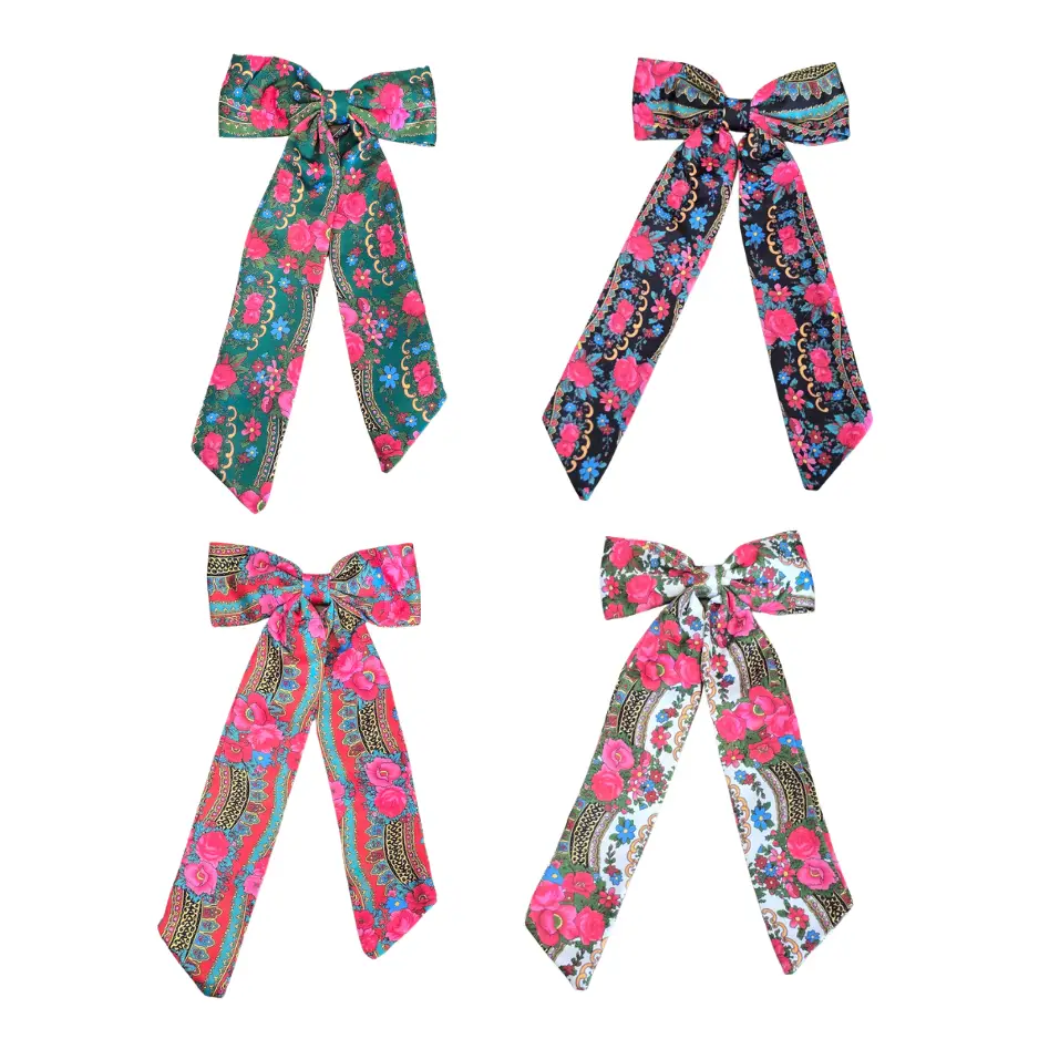 Quatro laços florais coloridos em diferentes fundos sobre fundo branco