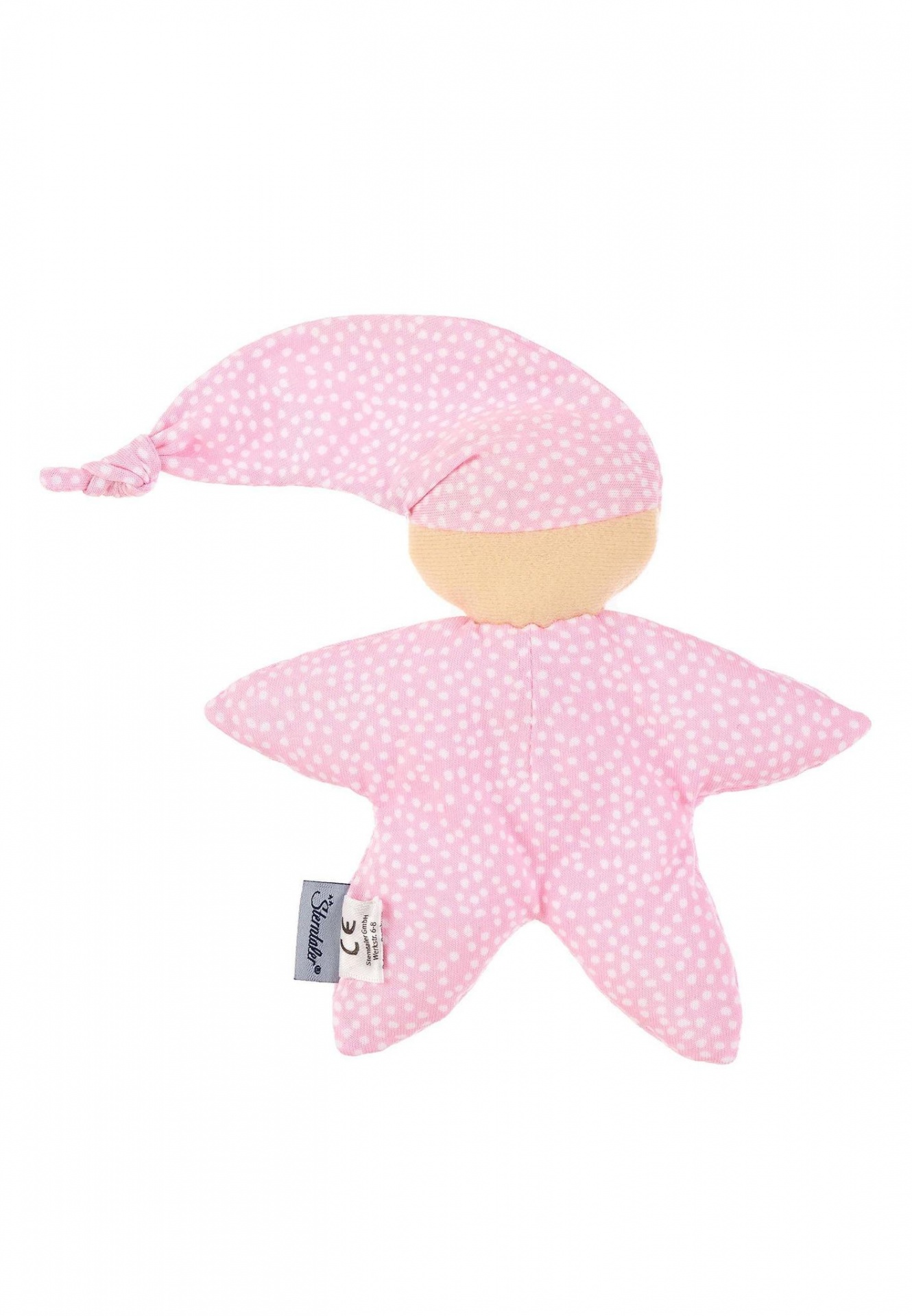 Boneco de peluche cor-de-rosa com manchas brancas, cabeça bege e chapéu pontiagudo.