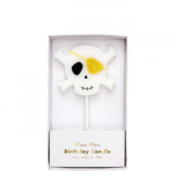 Vela de aniversário em forma de caveira com tapa-olho embalada numa caixa branca