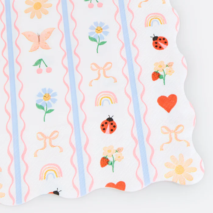 Guardanapo de papel decorado com padrões coloridos e bordas onduladas