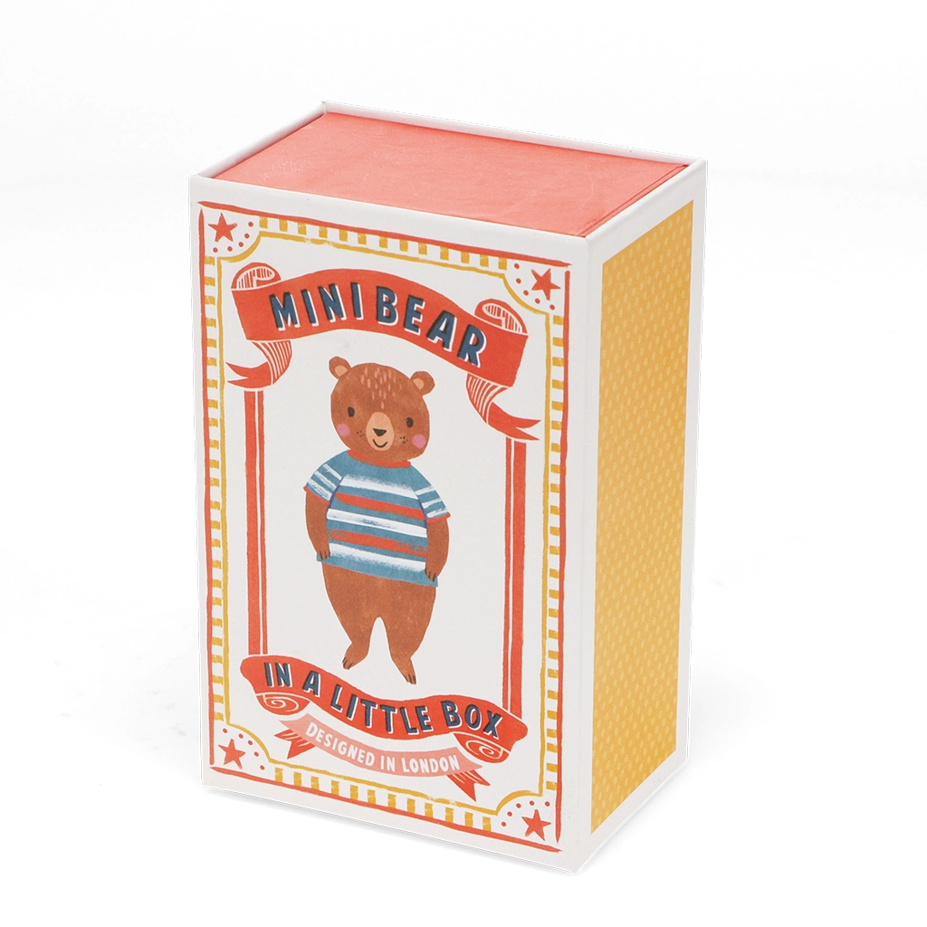Caixa ilustrada com urso e texto MINI BEAR IN A LITTLE BOX