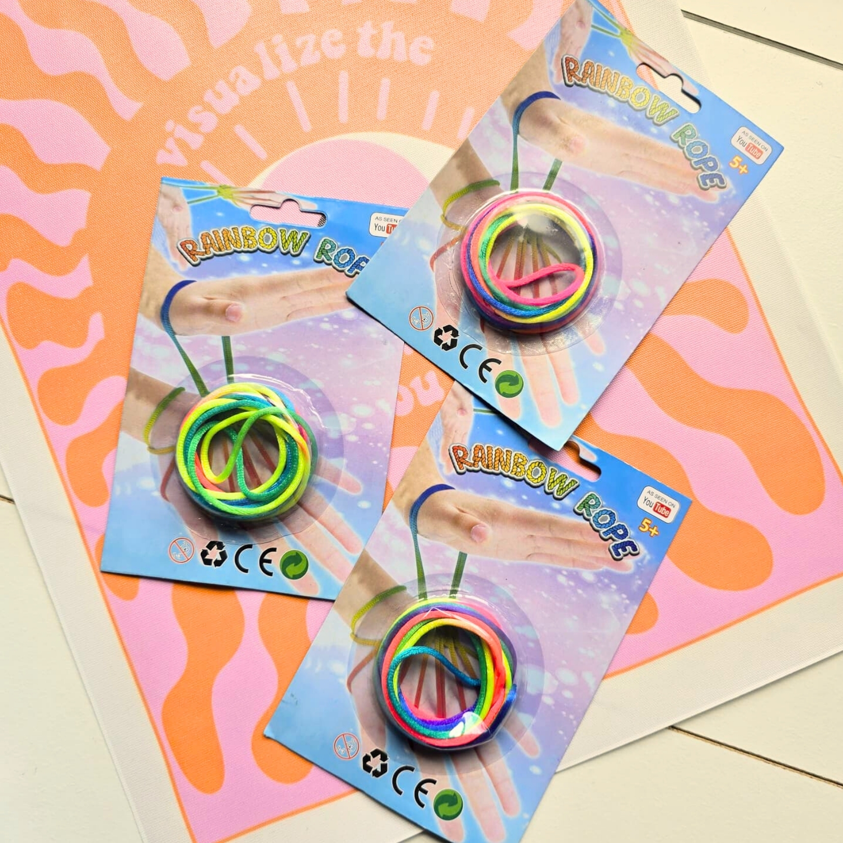 Embalagens de brinquedos Rainbow Rope com cordões coloridos