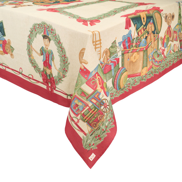 Toalha de mesa natalícia com brinquedos tradicionais e raminhos verdes
