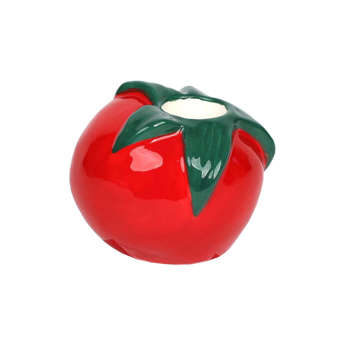 Vela decorativa em forma de tomate vermelho com folhas verdes no topo