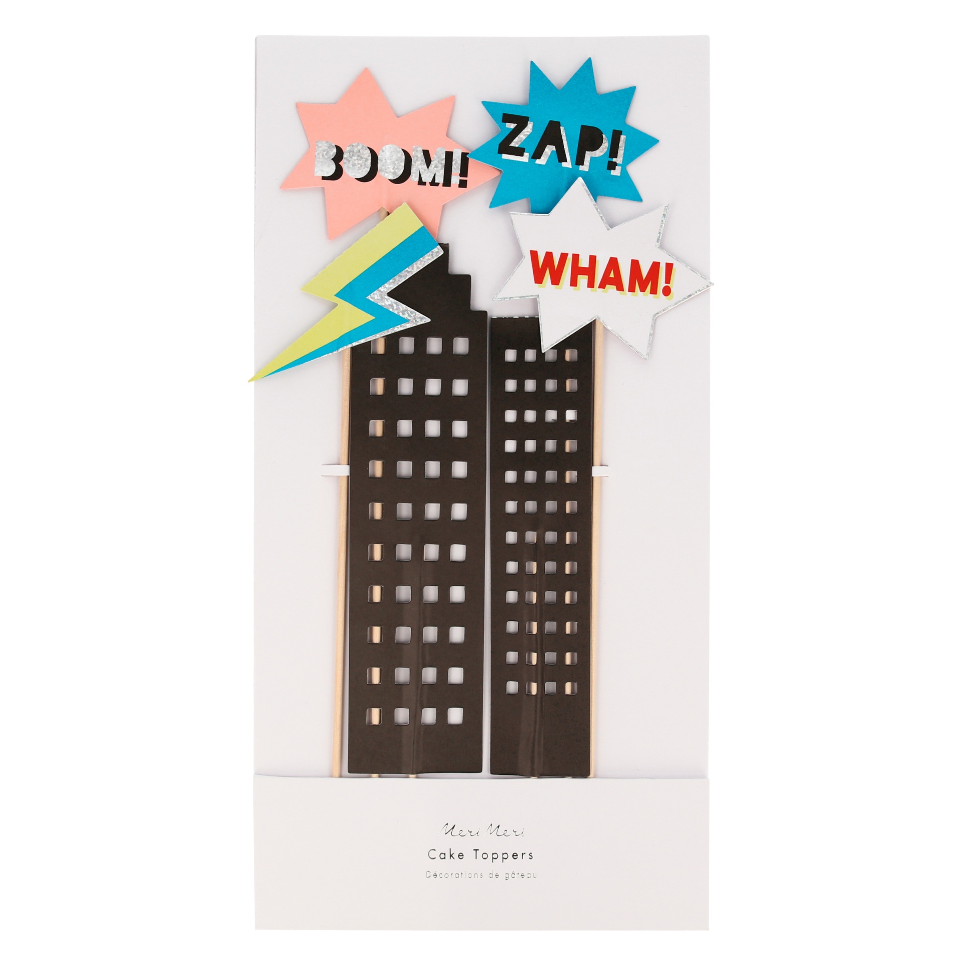 Cake toppers com edifícios pretos, raio colorido e balões de fala com texto