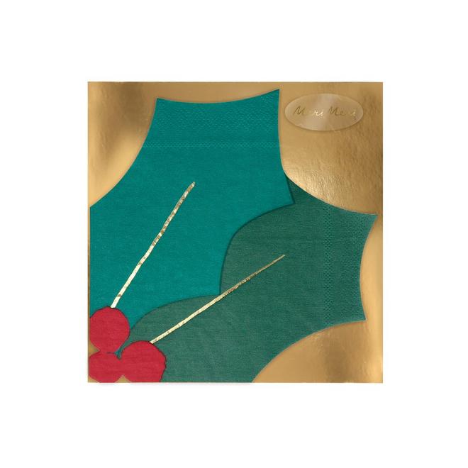 Embalagem dourada com duas meias verdes e flores vermelhas decorativas