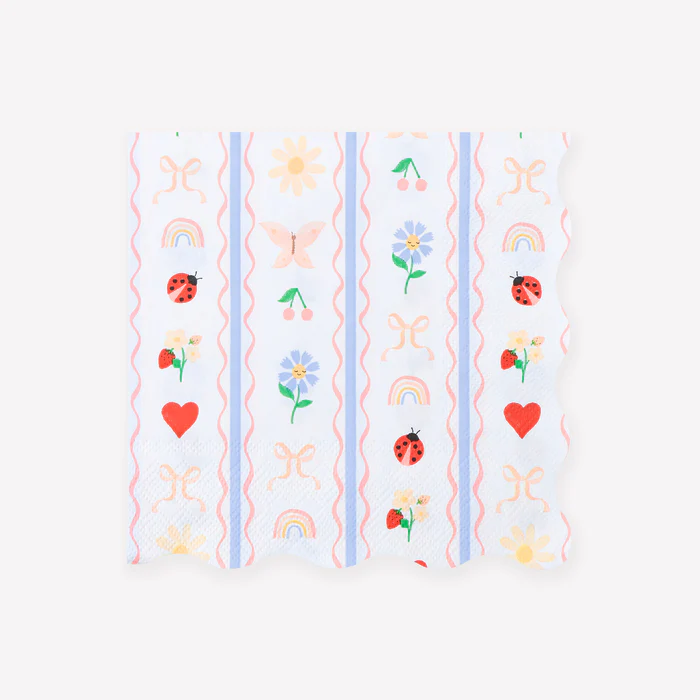 Guardanapo de papel branco com padrões coloridos variados de flores, frutas e insetos