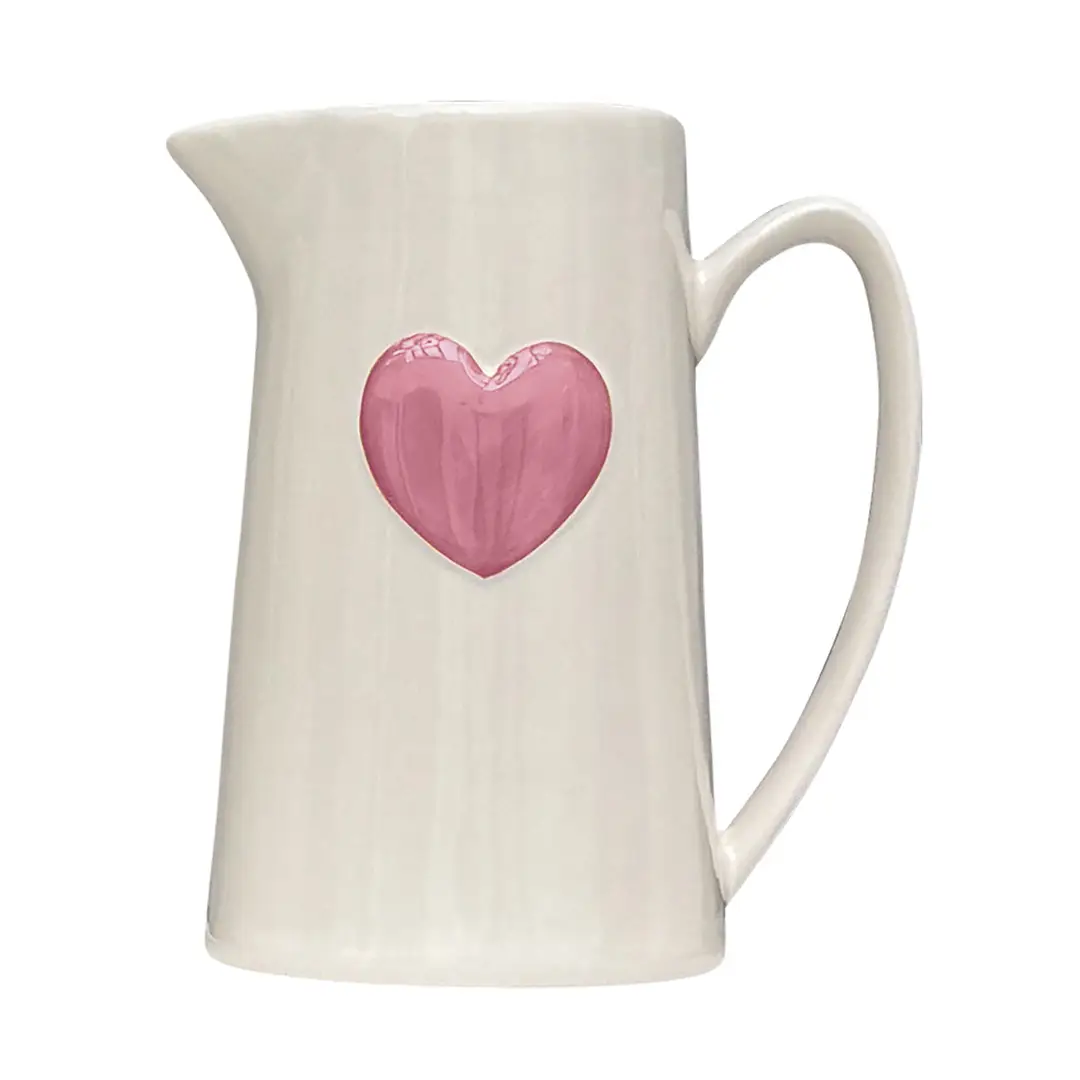 Jarro de cerâmica branco com coração rosa em relevo