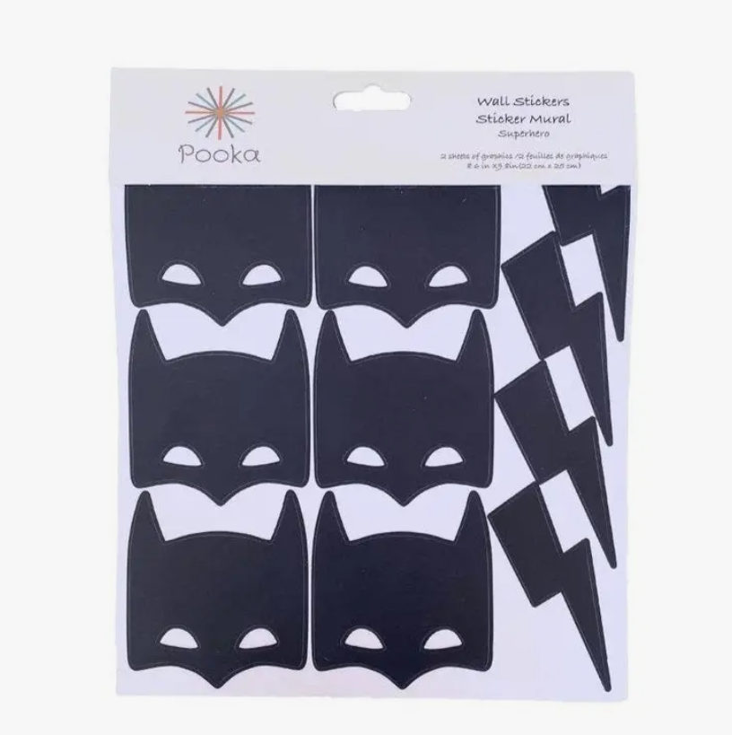 Adesivos de parede pretos formas de máscara e raios em embalagem branca com logo Pooka
