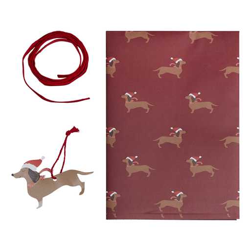 Papel de embrulho com padrão de cães dachshund com gorro de Natal, etiqueta de cão em madeira e fita vermelha.