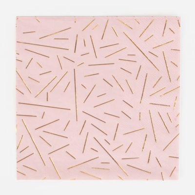 Guardanapo de papel rosa com padrão dourado de linhas
