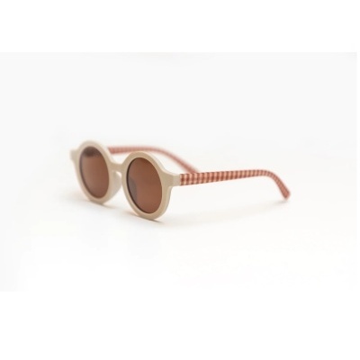 Óculos de sol redondos com armação bege e hastes xadrez vermelho e branco