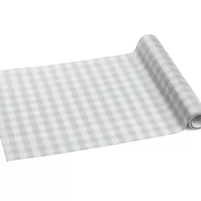 Rolo de papel ou plástico xadrez verde e branco desenrolado