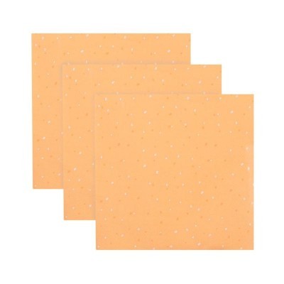 Três guardanapos de papel laranja com pontos brancos