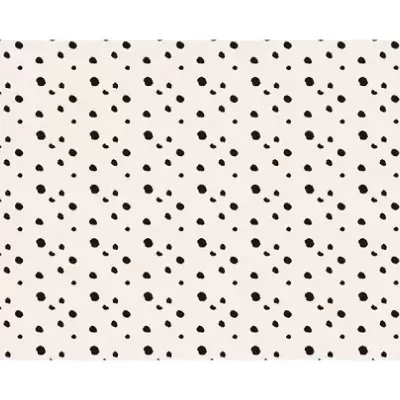 Tapete branco com manchas pretas irregulares