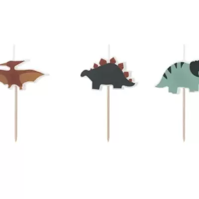 Três toppers de bolos em forma de dinossauros coloridos em palitos de madeira
