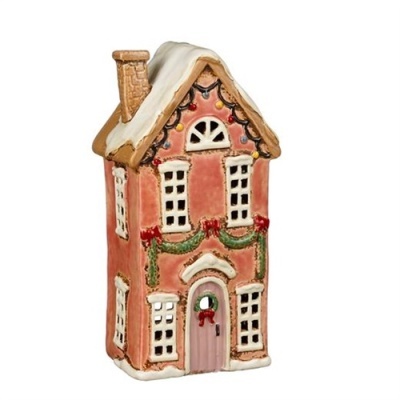 Miniatura casa de Natal decorativa cor de rosa com guirlandas e neve no telhado