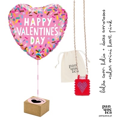 Balão cor de rosa em forma de coração com texto