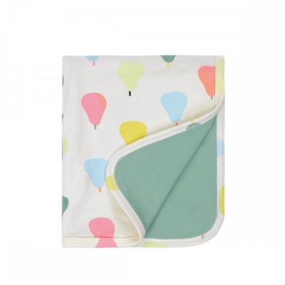 Manta para bebé com padrão de balões coloridos e verso verde