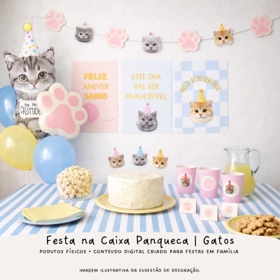 Decoração de festa de aniversário com tema de gatos, bolo branco, balões, pipocas, copos rosa e painéis decorativos no fundo.