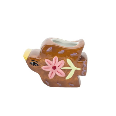 Vaso cerâmico em forma de pássaro com decoração floral