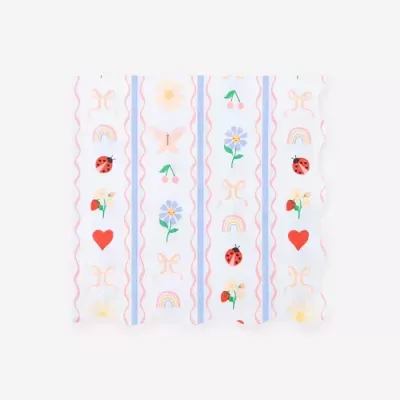 Guardanapo de papel branco com padrões coloridos variados de flores, frutas e insetos