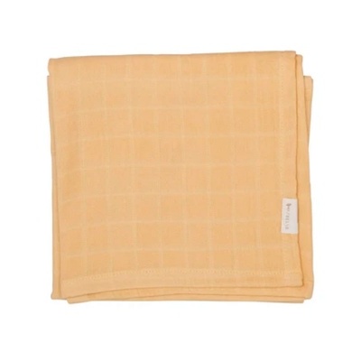 Manta ou toalha amarela clara com padrão quadriculado