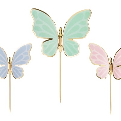 Decorações de borboleta em palitos dourados com asas em azul, verde e rosa pastel