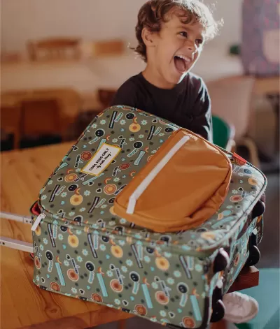 Mala de viagem com padrão de instrumentos musicais coloridos