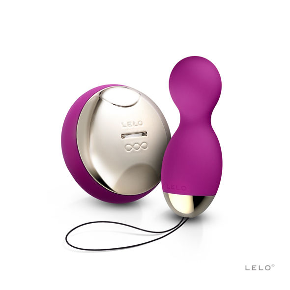 Dispositivos sexuais em silicone roxo com detalhes metálicos dourados, marca LELO