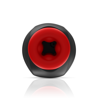 Objeto circular preto com interior vermelho e padrão em estrela preto