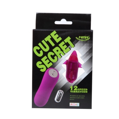 Embalagem de vibrador roxo com texto 'CUTE SECRET' em verde