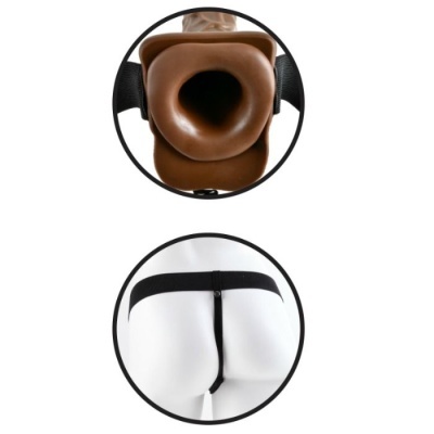 Arnês preto com peça central em material marron similar a pele com cavidade, visto na parte traseira de um manequim branco.