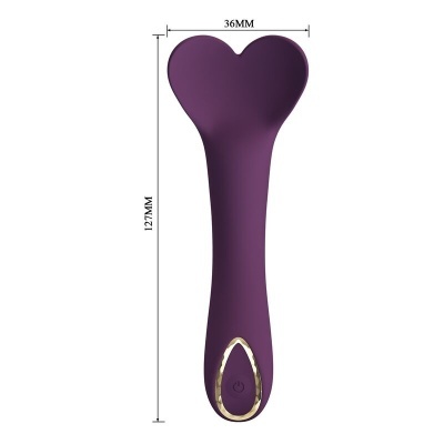 Dispositivo roxo com formato alongado e topo em forma de coração com detalhes dourados