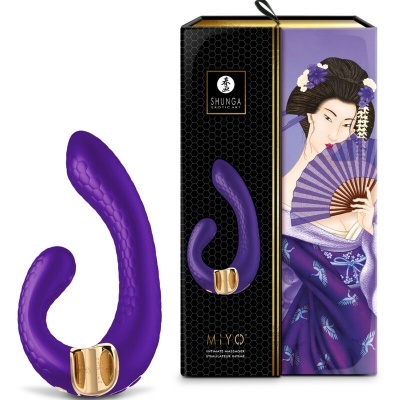 Vibrador duplo roxo com base dourada ao lado de caixa preta com imagem de mulher japonesa e texto MI YÔ