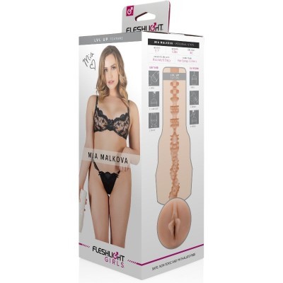 Embalagem de produto com imagem de mulher com lingerie preta e informações técnicas.