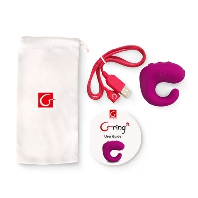 Produto com estojo branco, cabo USB vermelho, dispositivo roxo curvo e manual circular G ring XL