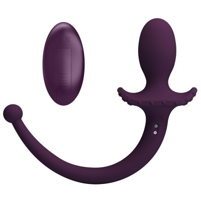 Dispositivo roxo com controlo remoto para uso anatómico.