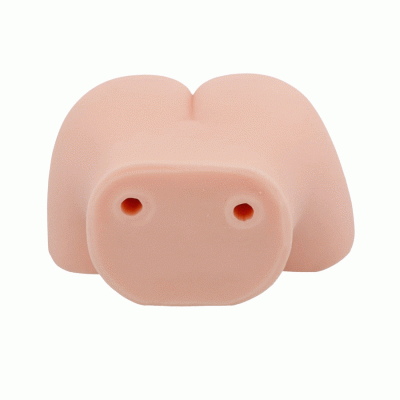 Produto em silicone cor de pele com duas aberturas circulares na parte frontal