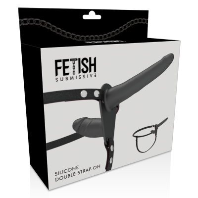 Caixa de embalagem preta com imagem de strap-on de silicone preto e texto Fetish Submissive.